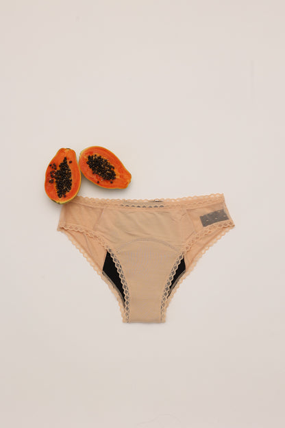 Flat lay of Cherrystain nude lacey brief light flow period underwear