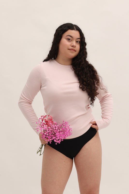 Front view of Cherrystain seamless bikini period underwear in black for medium flow