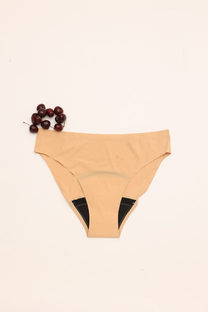 Flat lay of Cherrystain nude seamless bikini medium flow period underwear
