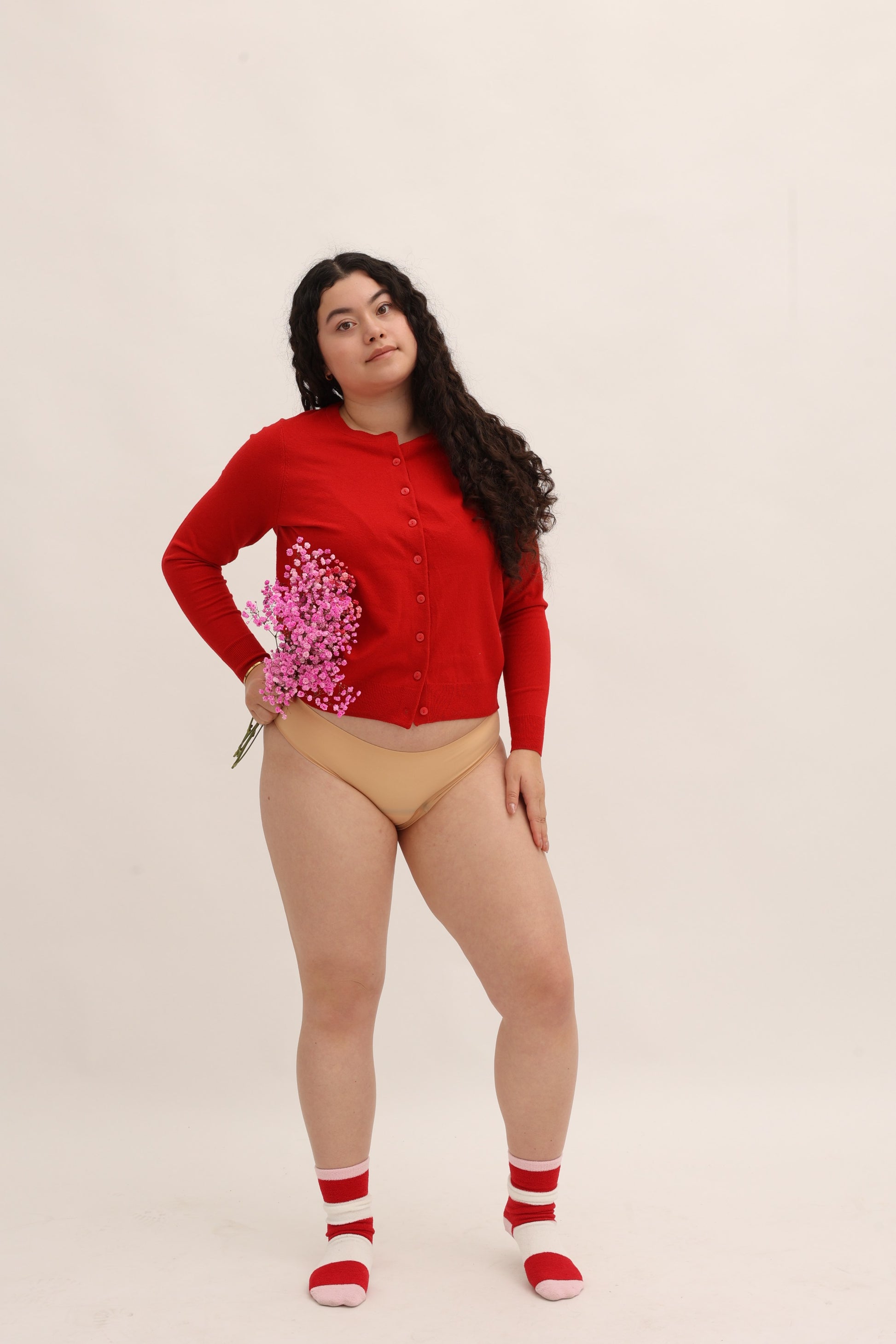 Full body front view of Cherrystain nude seamless bikini designed for medium flow periods