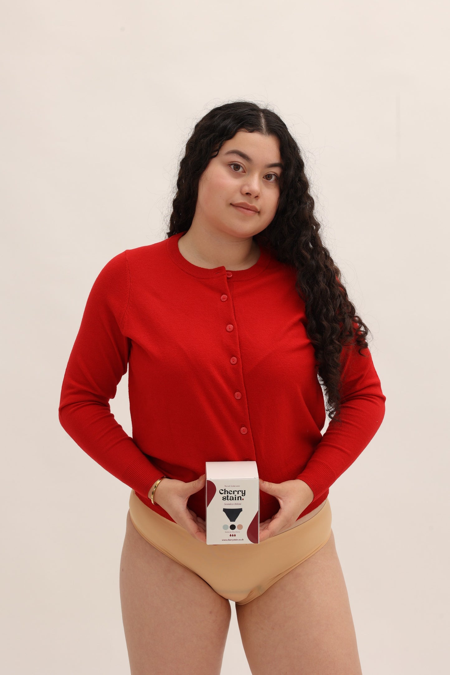 Lifestyle view of Cherrystain nude seamless bikini period underwear for medium flow